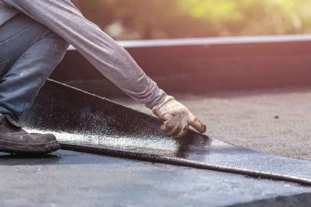 Professional Basement Waterproofing technician working in Harpersville, AL
